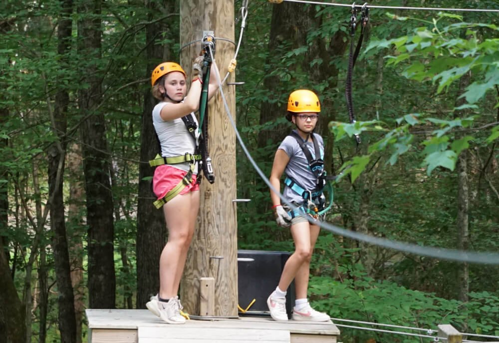 Kids on aerial ropes course at Brave Camp